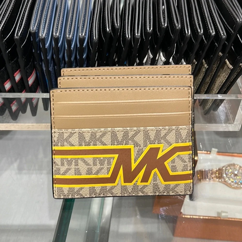 MICHAEL KORS MENS Cooper Graphic Logo Tall Card Case 36S3LCOD2B COLOR:Yellow NWT